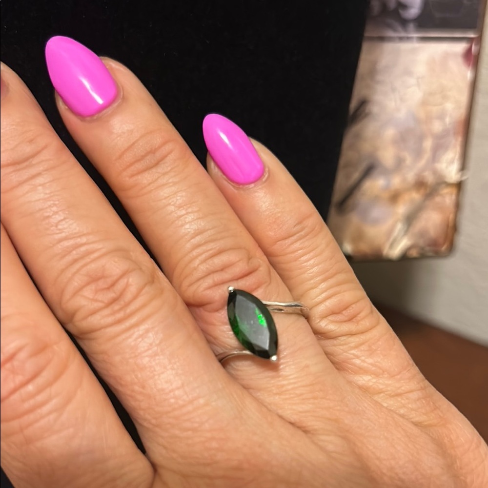 Elegant Silver Ring with Green Gemstone